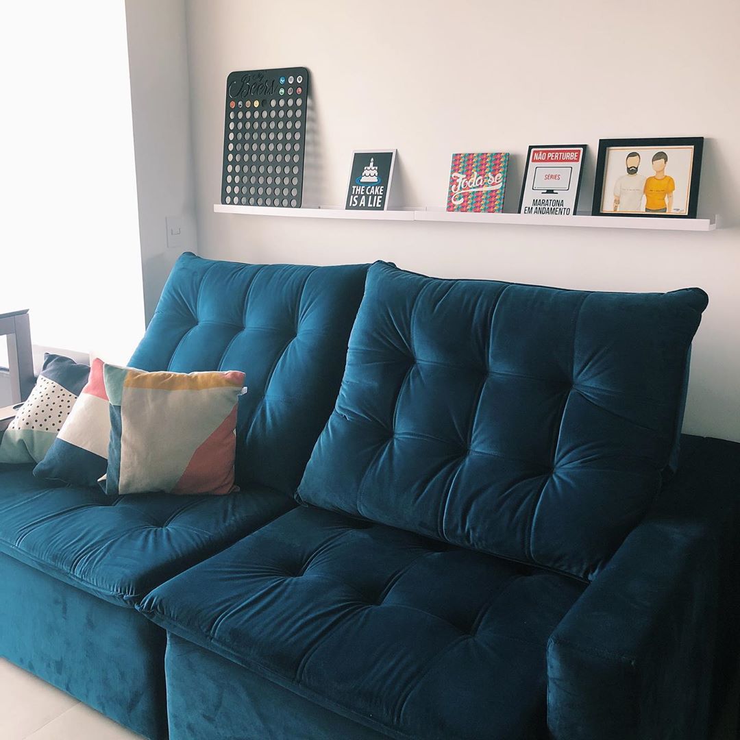 sofa azul retratil de veludo