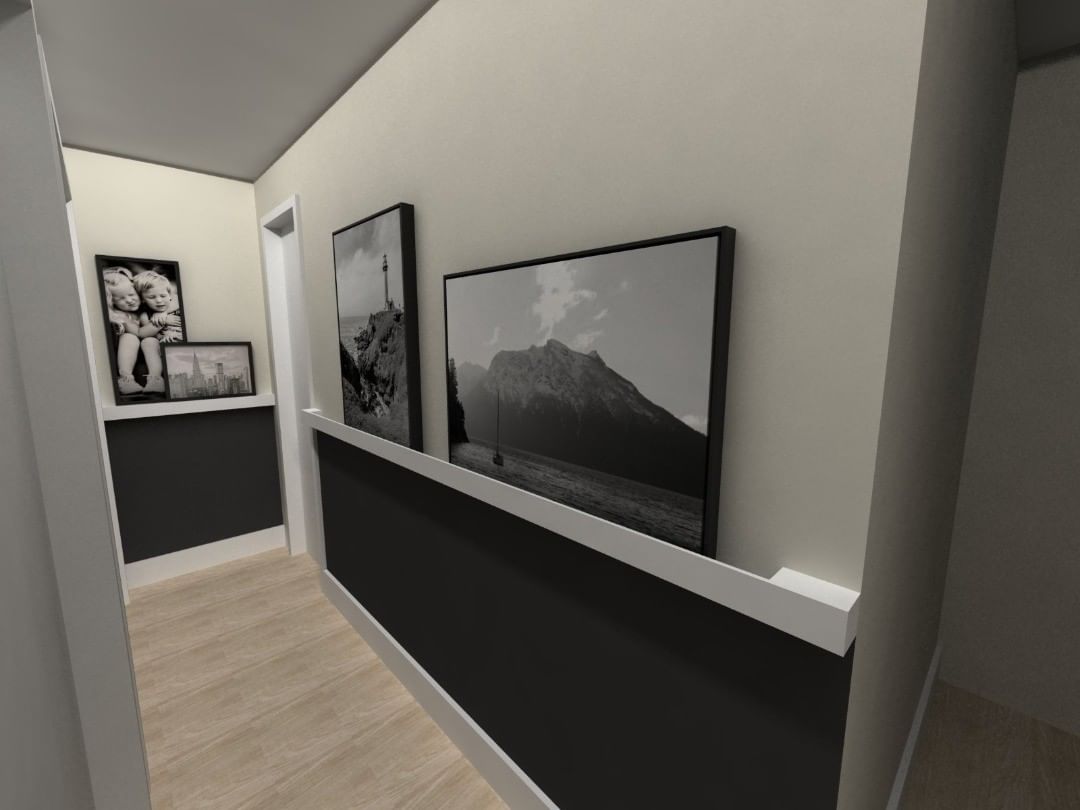 corredor com pintura em meia parede preta e quadros